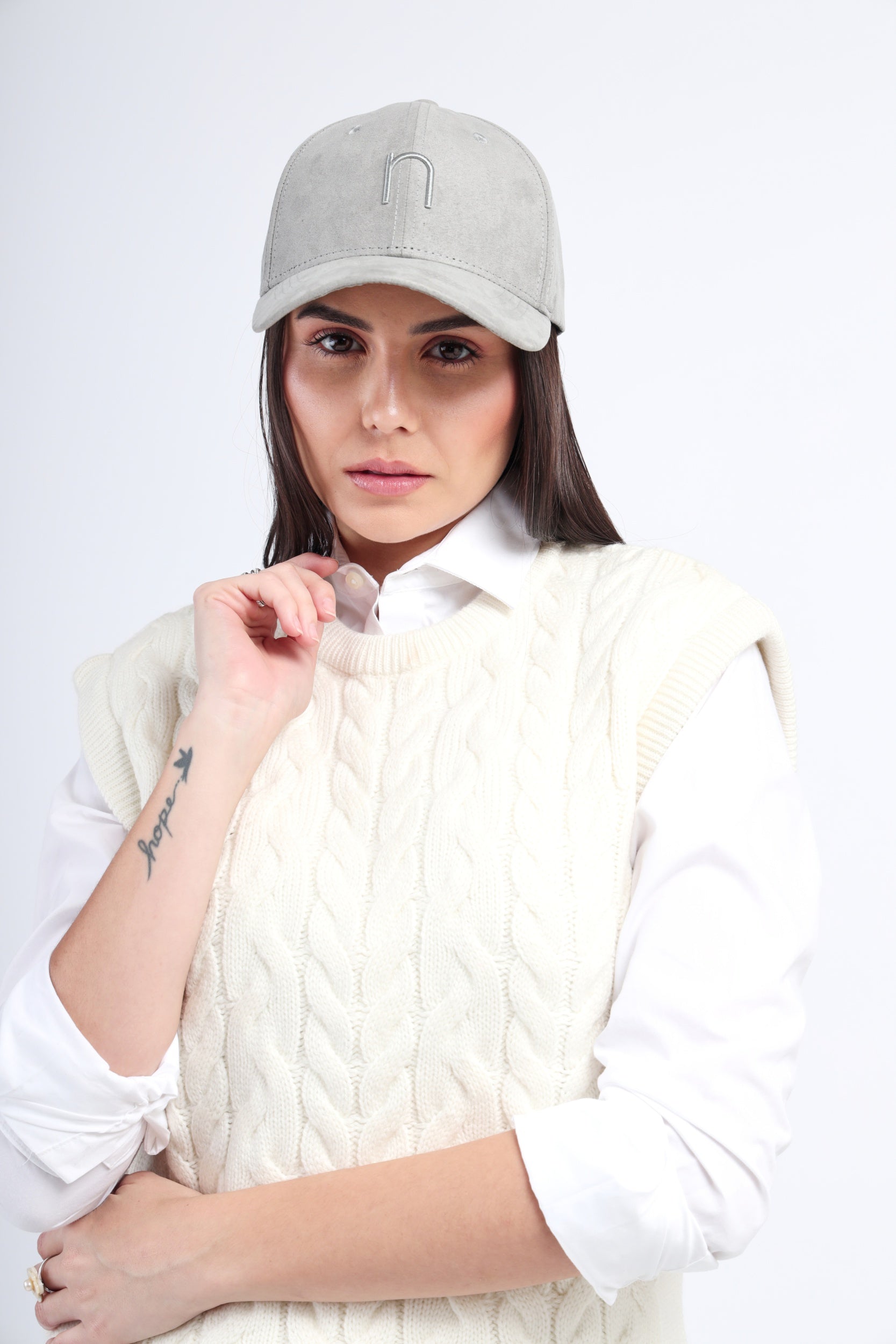 Close-up of Noggah Jet Set cap showing suede texture and branding