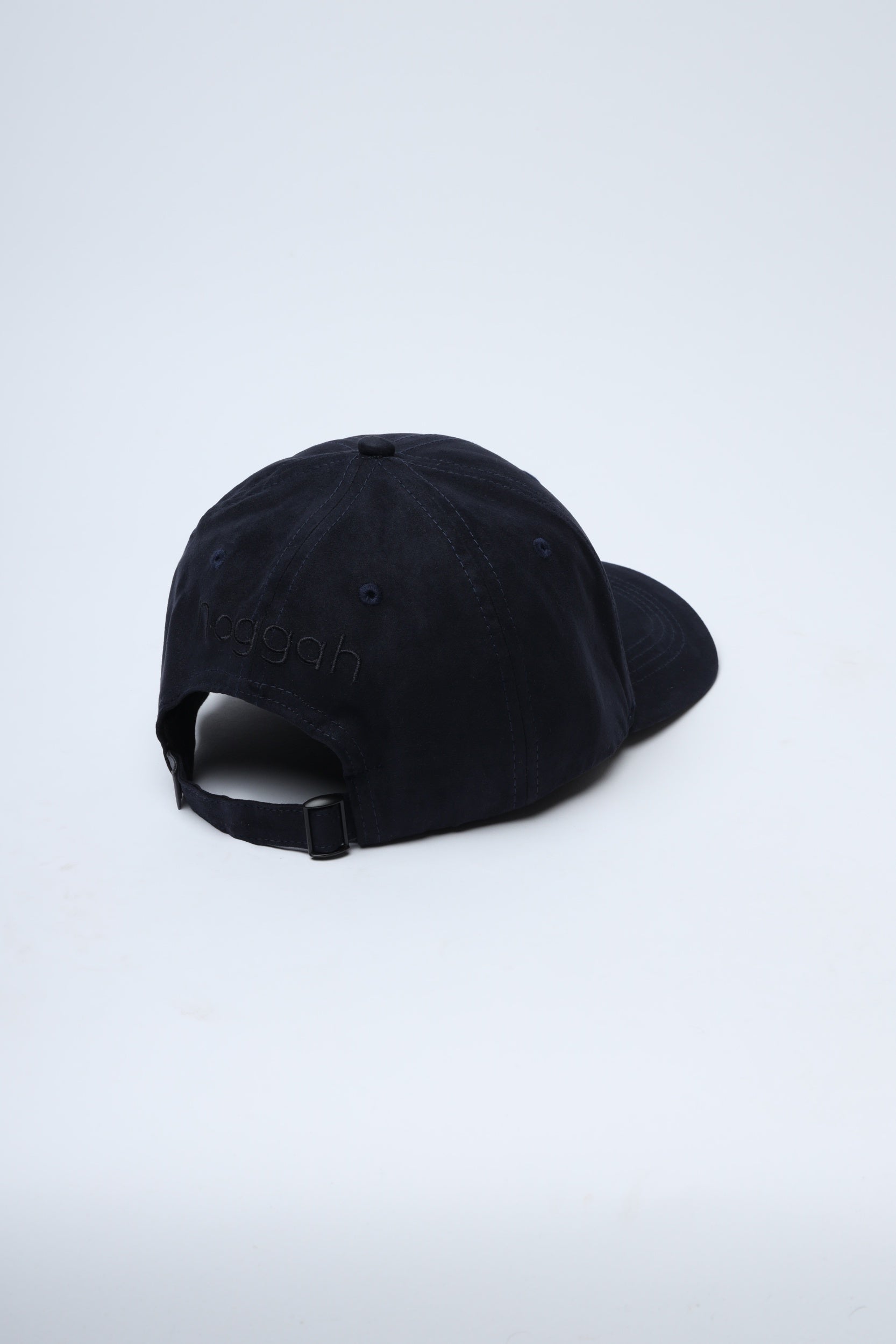 Lifestyle image of Noggah Coastal Vibe cap in relaxed outdoor setting