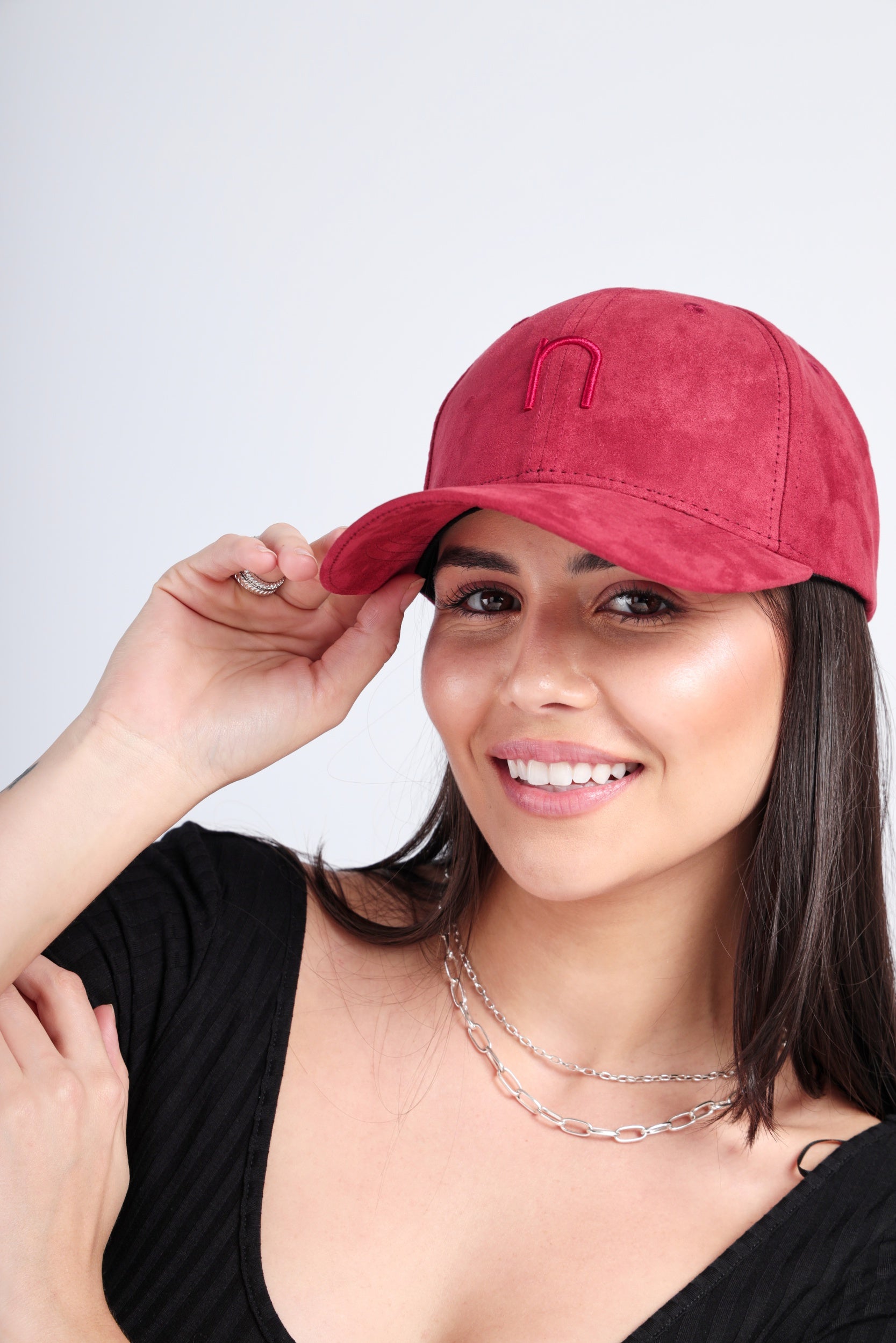 NDC007 deep red cap featuring soft suede texture and minimalist Noggah logo